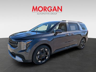2026 Kia Carnival — rear three-quarter view