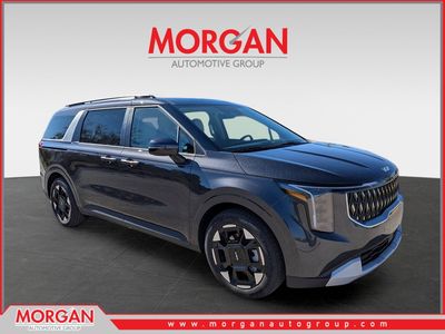 2026 Kia Carnival EX in Panthera Metal — front three-quarter view