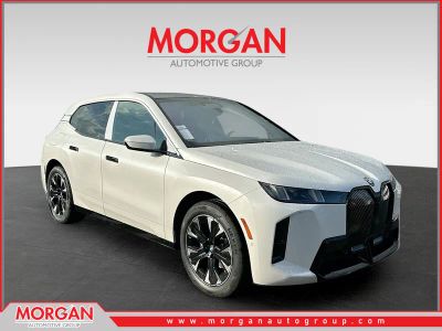 2026 BMW iX xDrive60 in White — front three-quarter view