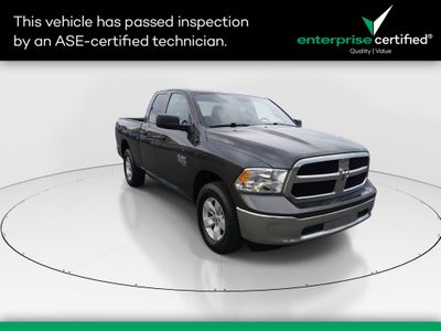 2024 Ram 1500 Classic SLT 4x4 Quad Cab 6'4" Box — front three-quarter view