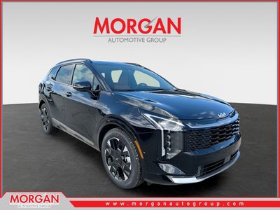 2026 Kia Sportage SX-Prestige in Ebony Black — front three-quarter view