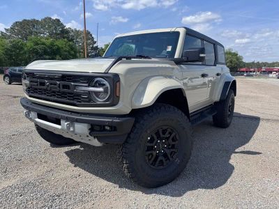 2026 Ford Bronco Raptor in Desert Sand — front three-quarter view