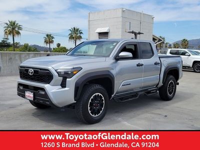 2025 TOYOTA TACOMA TRD OFF ROAD DOUBLE CAB 5' BED AT in Celestial Silver Metallic — front three-quarter view