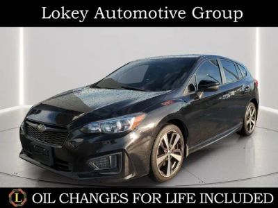 2018 Subaru Impreza 2.0i Sport in Crystal Black Silica — front three-quarter view