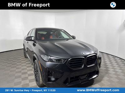 2026 BMW M Models Competition in Black Sapphire Metallic — front three-quarter view