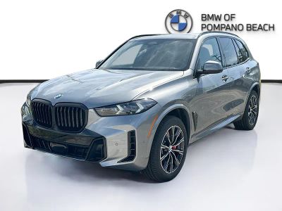 2026 BMW X5 — rear three-quarter view