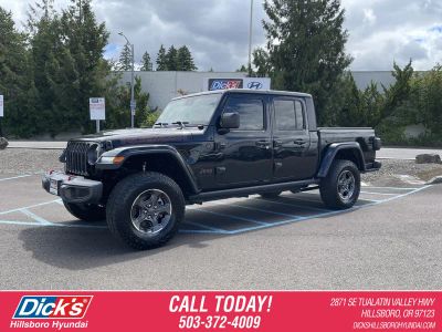 2020 Jeep Gladiator Rubicon in Black Clearcoat — front three-quarter view