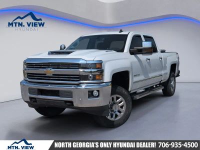 2017 Chevrolet Silverado 3500HD LTZ in Summit White — front three-quarter view