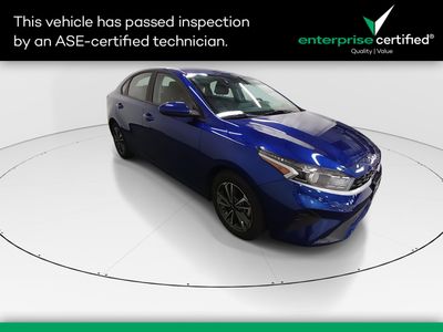 2024 Kia Forte LXS IVT — front three-quarter view