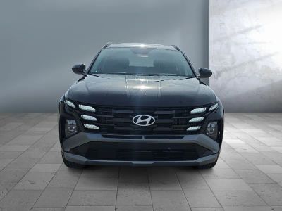 2026 Hyundai Tucson Hybrid — side profile view