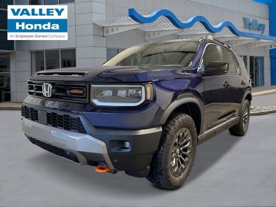 2026 Honda Passport TrailSport in Obsidian Blue Pearl — front three-quarter view