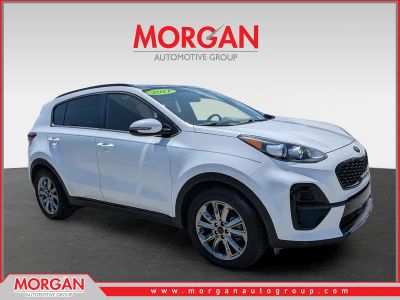2021 Kia Sportage S in Snow White Pearl — front three-quarter view
