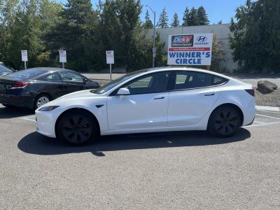 2025 Tesla Model 3 — side profile view