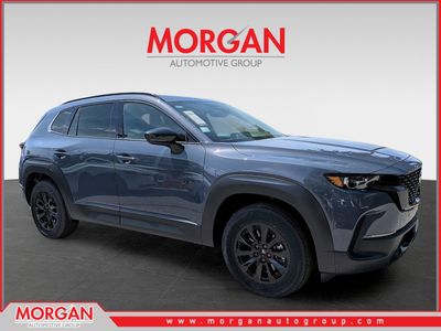 2026 Mazda CX-50 Hybrid Premium in Gray — front three-quarter view