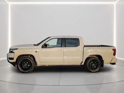 2026 Nissan Frontier — rear three-quarter view