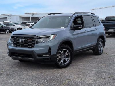 2023 Honda Passport TrailSport in Gray — front three-quarter view