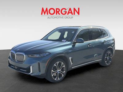2024 BMW X5 — rear three-quarter view
