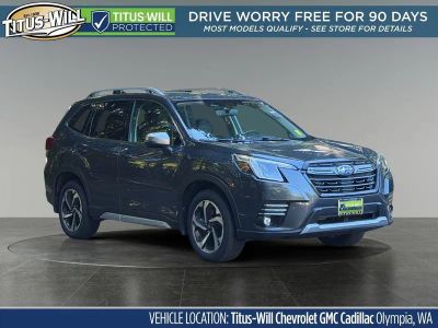 2024 Subaru Forester Touring in Gray — front three-quarter view