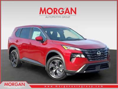 2026 Nissan Rogue SV in Red — front three-quarter view