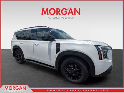 2025 Nissan Armada PRO-4X in Aspen White Tricoat — front three-quarter view