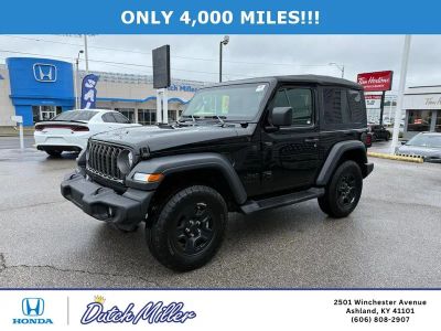 2025 Jeep Wrangler — rear three-quarter view