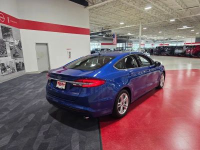 2018 Ford Fusion Hybrid — rear three-quarter view