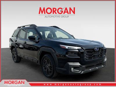 2026 Subaru Outback Limited XT in Crystal Black Silica — front three-quarter view