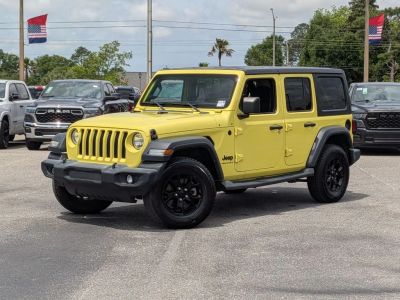 2023 Jeep Wrangler Sport S in Yellow — front three-quarter view