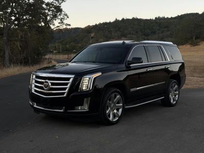 2015 Cadillac Escalade in Black — front three-quarter view