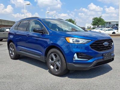 2022 Ford Edge SEL AWD in Blue Metallic — front three-quarter view