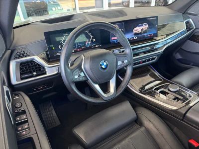 2025 BMW X5 — rear three-quarter view