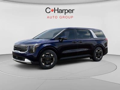 2026 Kia Carnival — rear three-quarter view