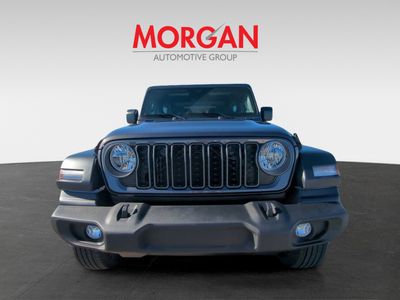 2026 Jeep Wrangler — rear three-quarter view