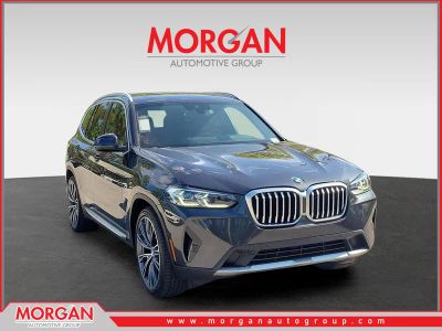2022 BMW X3 sDrive30i in Dark Graphite Metallic — front three-quarter view