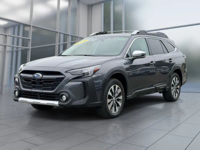 2024 Subaru Outback Touring XT in Magnetite Gray Metallic — front three-quarter view