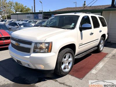 2012 Chevrolet Tahoe in White — front three-quarter view