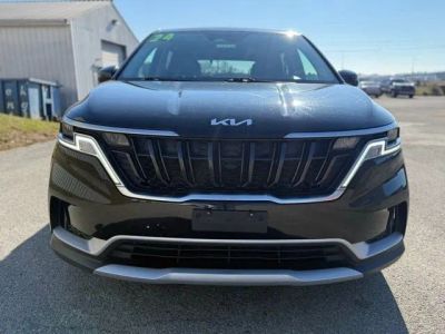 2024 Kia Carnival — side profile view