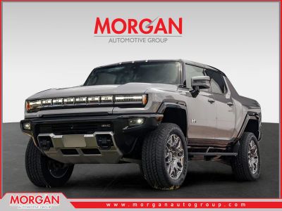 2025 GMC Hummer EV Pickup 3X in Gray — front three-quarter view