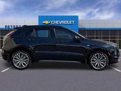2024 Cadillac XT4 — rear three-quarter view