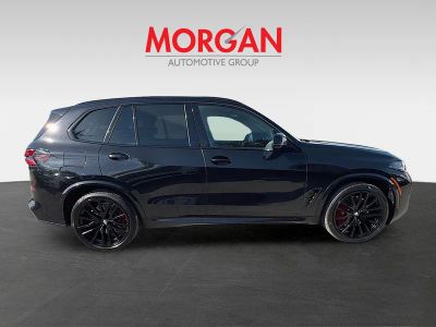 2024 BMW X5 — rear three-quarter view