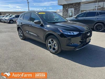 2025 Ford Escape ST-Line in Agate Black Metallic — front three-quarter view