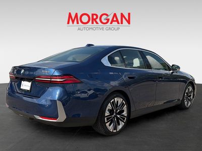 2026 BMW 5 Series — rear three-quarter view