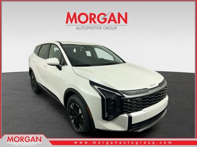 2026 Kia Sportage Hybrid LX in Snow White Pearl — front three-quarter view