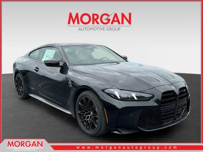 2026 BMW M4 Competition in Black — front three-quarter view