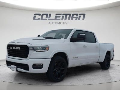 2026 RAM 1500 Laramie in Bright White Clear-Coat Exterior Paint — front three-quarter view
