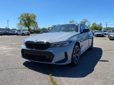 2026 BMW 3 Series 330i xDrive in Brooklyn Grey Metallic — front three-quarter view