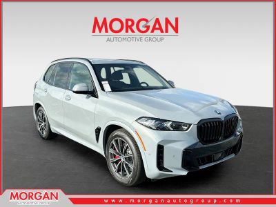2026 BMW X5 xDrive50e in Gray — front three-quarter view