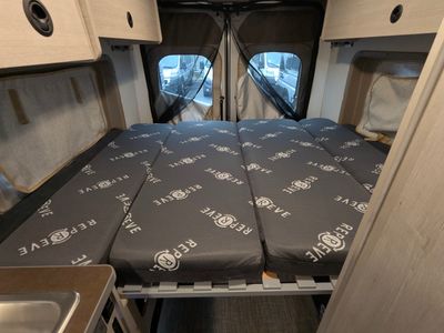 2026 Winnebago Solis — rear three-quarter view