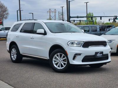 2021 Dodge Durango SXT Plus AWD in White Knuckle Clearcoat — front three-quarter view