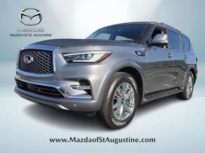 2021 INFINITI QX80 LUXE in Gray — front three-quarter view